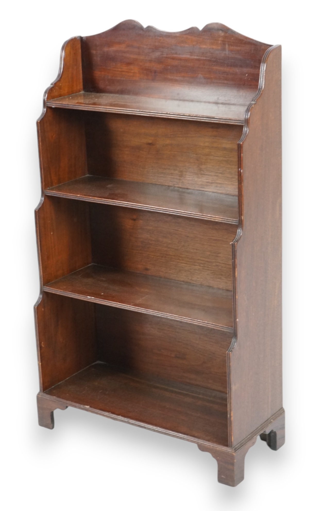 A Regency style mahogany waterfall bookcase